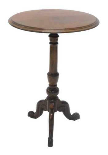 A late 19thC oak occasional table, the circular top on a gun barrel and urn stem, on triple...