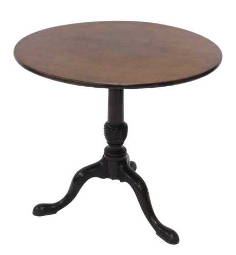 A 19thC mahogany tilt top tripod table, the one piece top, raised on plain stem terminating in...
