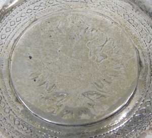 Four silver dishes, inset with European coins, to include Theresa style, unmarked white metal,... - 4
