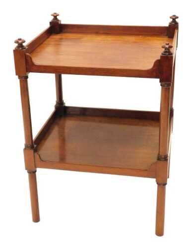 A 20thC oak two tier whatnot or trolley, with galleried top, the two shelves broken by plain...