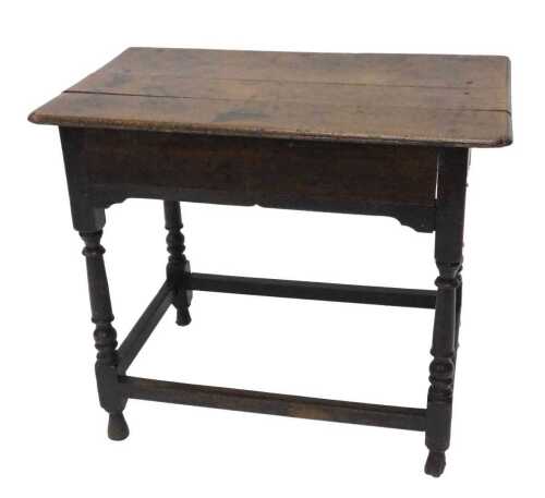 A principally 18thC oak side table, the carved plank top, raised on turned supports terminating...