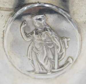 An Edward VII silver cream jug, with strap handle, helmet shaped body, inverted stem and oval... - 2