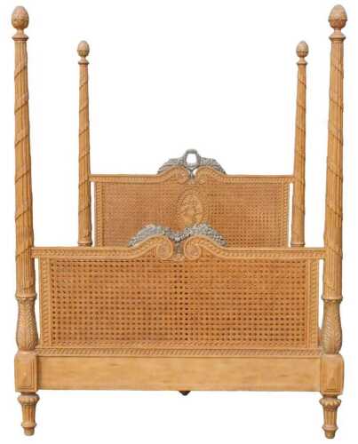 An elaborate 20thC bespoke kingsized four poster bed, with heavily carved cone and acanthus leaf...