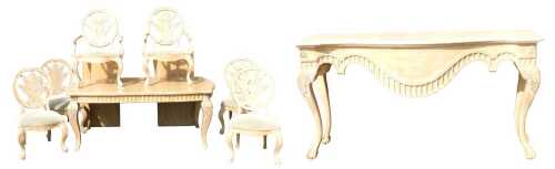 A highly decorative late 20thC light oak dining room suite, comprising extending table, with two...