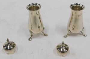 A pair of Edward VII silver pepper pots, each with urn finials, pierced domed removable lids,... - 2