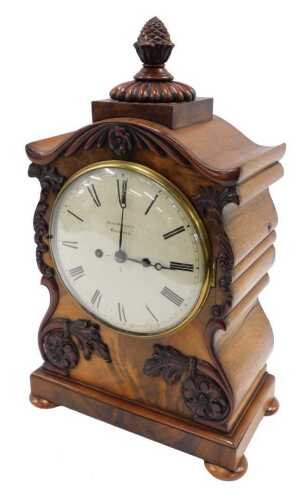 A 19thC mahogany cased bracket clock, the 21cm diameter Roman numeric dial signed John Bullock...