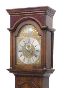 A fine 18thC brass faced longcase clock, the arched dial with raised plaque, signed Obediah...