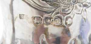 A Victorian silver cream jug, with flared rim, acanthus leaf ear handle, bulbous, repousse... - 5