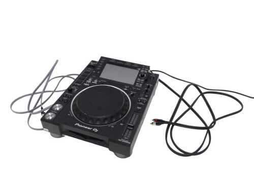 V - A Pioneer DJ multiplayer CDJ-2000 NXS2 professional digital multiplayer, featuring large jog...