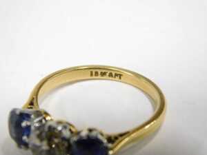 A diamond and sapphire three stone dress ring, with old cushion cut diamond, 6mm x 5.2mm x 4.4mm,... - 2