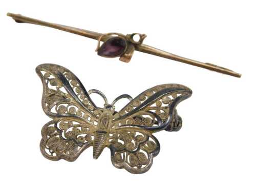 Two brooches, comprising a 9ct gold flower brooch, set with teardop cut amethyst, one stone...