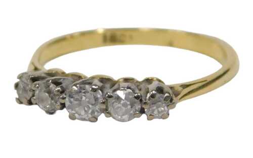 A diamond five stone dress ring, set with five old cut graduated diamonds, ranging from 0.02ct -...