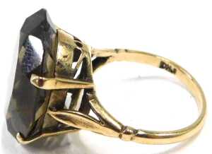 A 9ct gold smokey quartz dress ring, set with oval cut smokey quartz, in a raised four claw... - 2