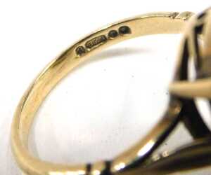 A 9ct gold smokey quartz dress ring, set with oval cut smokey quartz, in a raised four claw... - 3