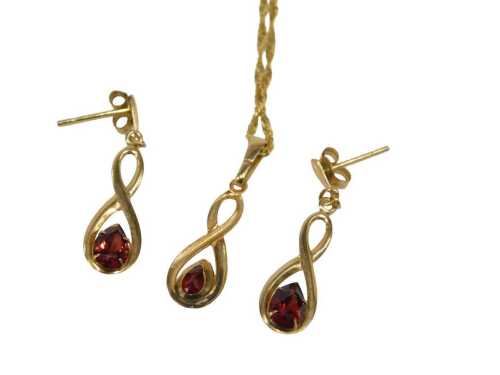 A 9ct gold jewellery set, comprising pendant and chain, and earrings, each set with pear cut...