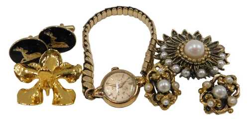 A 9ct gold cased Omega lady's wristwatch, with a silvered batoned dial, on an expanding gold...