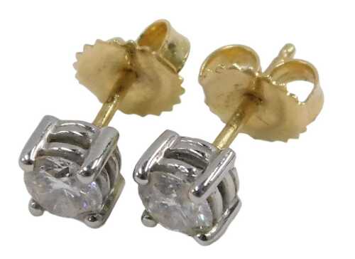 A pair of 18ct gold diamond stud earrings, each set with round brilliant cut diamond, approx...
