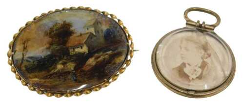 Two late 20thC jewellery items, comprising a painted cottage scene brooch, in yellow metal twist...