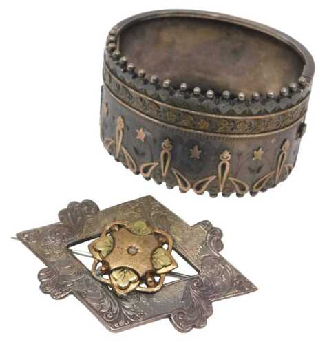 Two Victorian and later jewellery items, comprising a Victorian half hinged bangle, with raised...