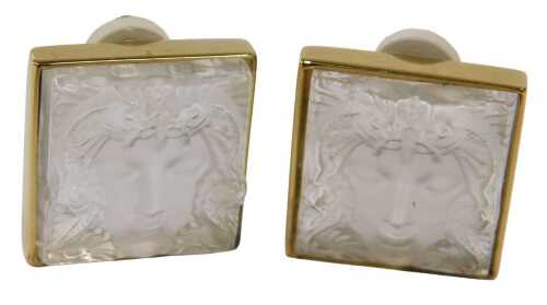 A pair of Lalique earrings, each of square form, with a Masque du Famille head, stamped Lalique...