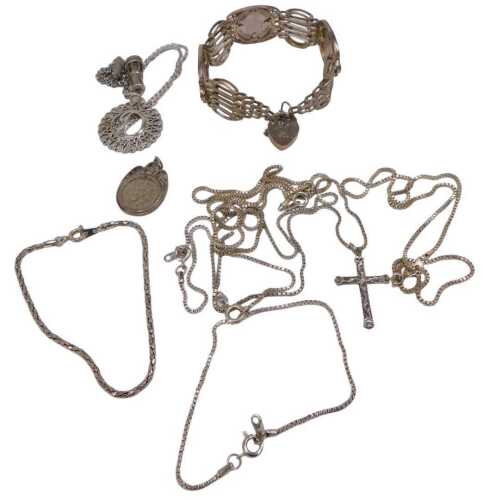A group of silver and white metal jewellery, comprising two silver bracelets, two silver...