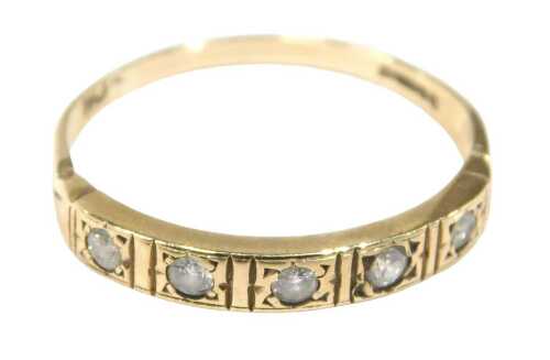 A 9ct gold half hoop diamond dress ring, set with five round brilliant cut diamonds, each claw...