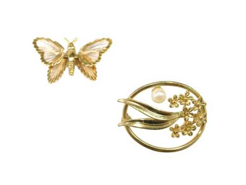 Two gold plated brooches, comprising a Monet butterfly brooch, 3cm wide, and a floral and...