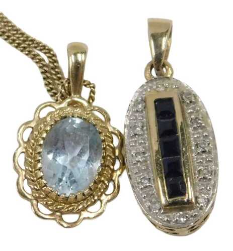 A 9ct gold aquamarine pendant and chain, the pendant formed as floral cluster with central...