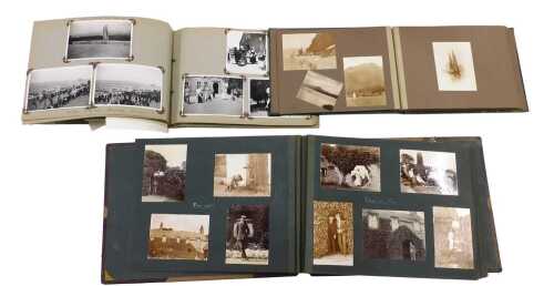 A photograph album containing a quantity of late 19th and early 20thC photographs, various...