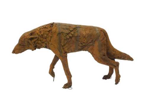 An iron resin sculpture of a standing wolf, 79cm high.