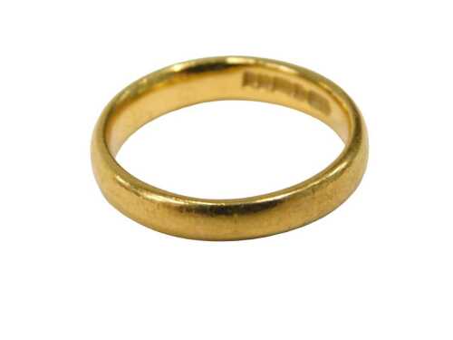 A 22ct gold wedding band, of plain design, 4mm width, maker P&W, Birmingham 1899, ring size L&frac12;,...