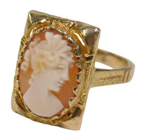 A 9ct gold shell cameo dress ring, the cameo depicting maiden looking dexter, in a claw...