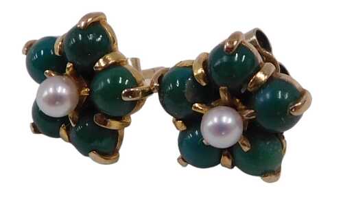 A pair of turquoise and seed pearl stud earrings, each formed as a floral cluster, with single...
