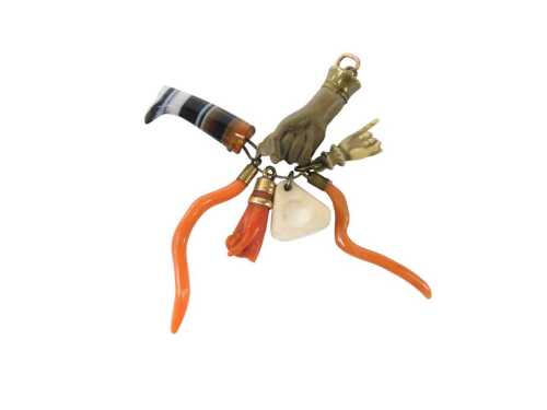 A group of 19thC seals, comprising carved lava hand, agate boot, two coral stems, a coral hand,...