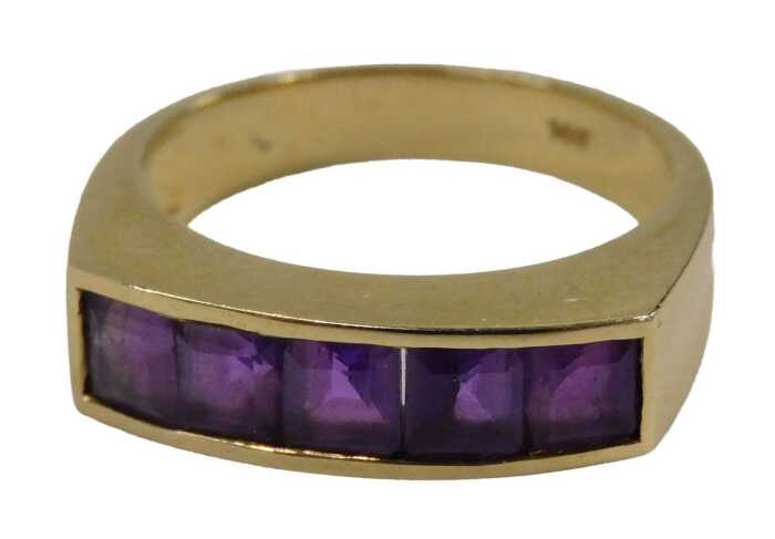 An amethyst half hoop dress ring, set with five square cut amethyst in tension settings, on a...