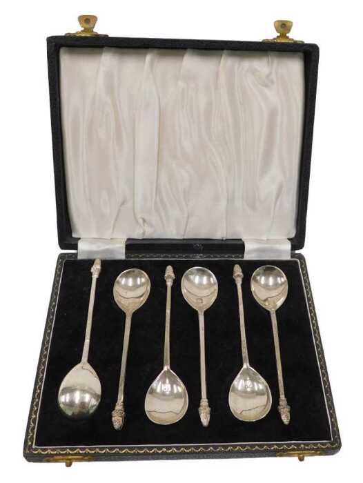 A set of six Elizabeth II silver teaspoons, each with figure head tops, trefid style, by...