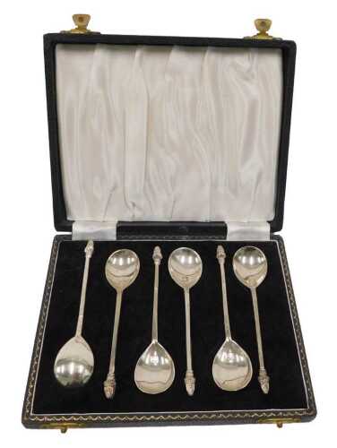 A set of six Elizabeth II silver teaspoons, each with figure head tops, trefid style, by...
