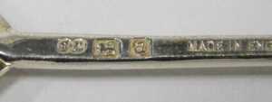 A set of six Elizabeth II silver teaspoons, each with figure head tops, trefid style, by... - 4