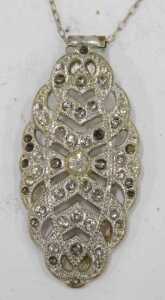A Victorian silver vesta case, of oblong form, with plain ring top and hinged lid, chased with... - 4