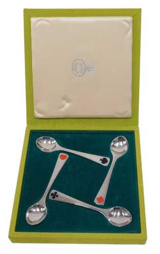 A cased set of Georg Jensen enamel card suit spoons, marked 925 sterling, in fitted case.