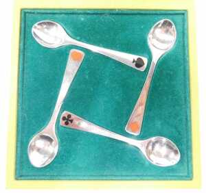 A cased set of Georg Jensen enamel card suit spoons, marked 925 sterling, in fitted case. - 5