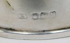 Various napkin rings, a chased example, another plain, a D end example, Birmingham 1948, 5cm... - 3