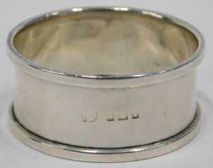 Various napkin rings, a chased example, another plain, a D end example, Birmingham 1948, 5cm... - 8