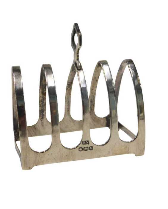 A George V silver four sectional toast rack, with mitre handle and sections, by Edward Viner,...