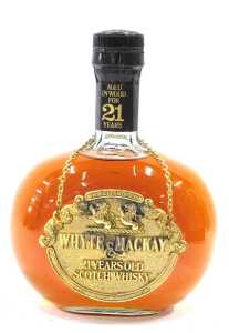 A bottle of White & Mackay twenty-one year old Scotch whisky, in case, with scroll. - 2