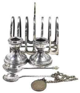 A George V silver seal top spoon, with flame finial, plain handle and shaped bowl, with traces...