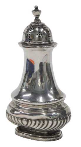 A Victorian silver pepper pot, with urn finial, pierced domed lid, inverted stem and part...