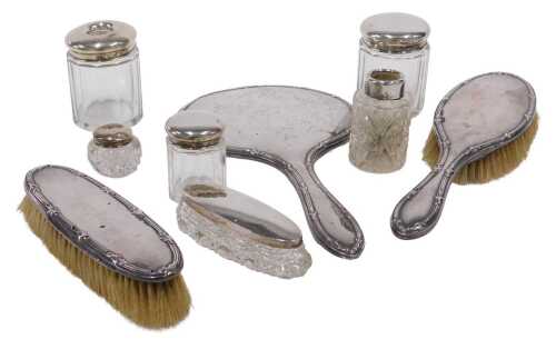 Various silver topped dressing table items, three piece dressing table set, a 20thC cut glass...
