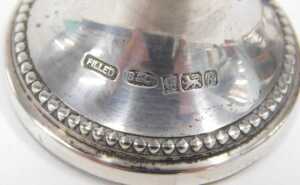 An Elizabeth II silver photograph frame, of plain oval form, with easel back, the opening for... - 4