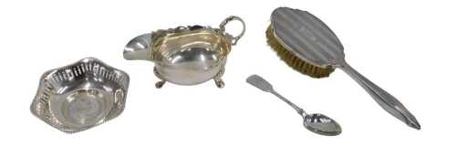 A George V sauceboat, with flying acanthus leaf handle, flared rim and triple hoof feet, by H H...